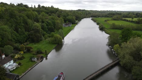 Marsh-Lock-on-River-Thames-UK-large-boat-leaving-lock-Aerial-footage