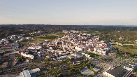 Rotating-aerial-over-Silves,-city-and-municipality-in-the-Portuguese-region-of-Algarve