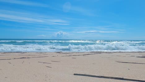 Beautiful-time-lapse-on-a-sunny-day-on-a-calm-pristine-beach-with-blue-skies-in-North-Carolina-in-the-Outer-Banks-in-Nags-Head-during-early-summer