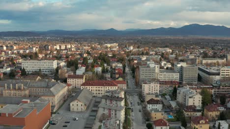 Aerial-shot-circling-over-the-capital-of-Slovenia,-Ljubljana-on-an-overcast-day