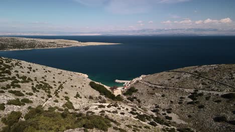 4k-Aerial-view-of-the-beautiful-landscape-in-Croatia-straight-shot-towards-the-immense-coast-of-the-Adriatic-Sea-under-a-blue-sky