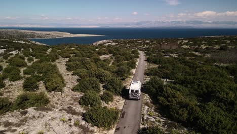 Take-a-straight-air-behind-a-van-with-bikes-on-the-way-to-the-croatian-coast-traveling-through-the-green-mountains-4k