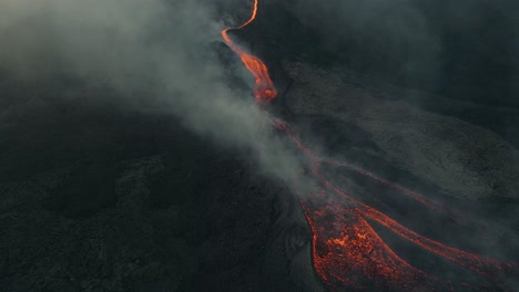 Drone-Aerial-Rising-shot-of-lava-flows-from-Pacaya-volcano-in-Guatemala