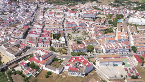 AERIAL---Arcos-de-la-Frontera-in-Cadiz,-Andalusia,-Spain,-wide-spinning-shot