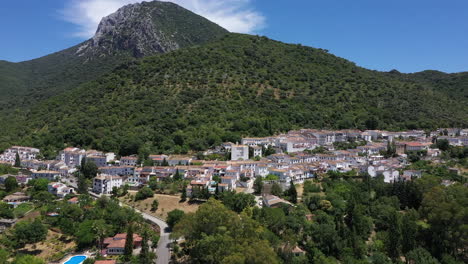 AERIAL---Village-of-Grazalema-in-Cadiz,-Andalusia,-Spain,-wide-shot-pan-right