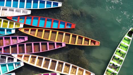 Colorful-boats-parking-in-Tamasopo-River,-San-Luis-Potosi,-Mexico