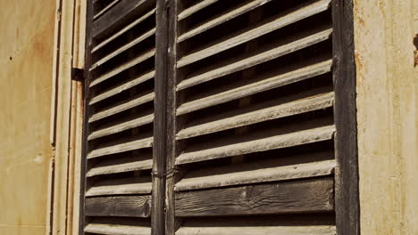 Wooden-shabby-window-shutters