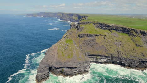 Aerial-spin-around-the-cliff-where-Moher-Tower-is-located