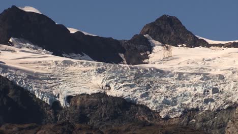 Remnants-of-a-once-large-Glacier-in-between-mountains-of-Alaska
