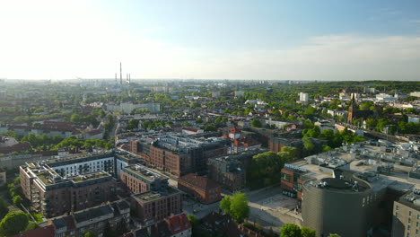 Aerial-of-Gdansk-with-variety-of-buildings-and-bright-sunlight-in-sky