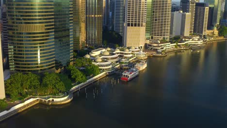 Aerial-View-Of-Eagle-Street-Pier-Ferry-Terminal-By-The-River-In-Brisbane-City,-Australia