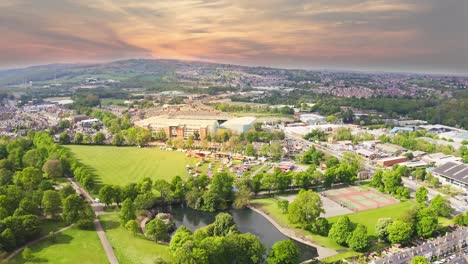 Wide-aerial-shot-overlooking-Hillsborough-Stadium-and-Sheffield-city-at-sunset