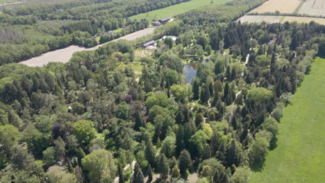 Aerial-of-beautiful-green-park-with-two-small-ponds