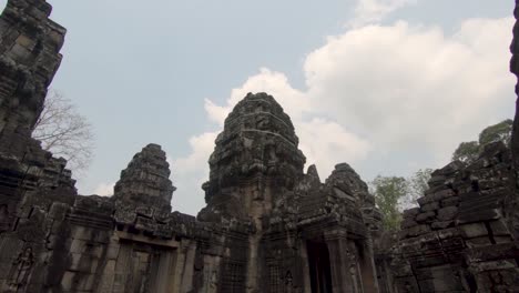 Slow-pan-down-inside-a-patio-at-the-ruins-of-Angkor-Wat-in-Cambodia