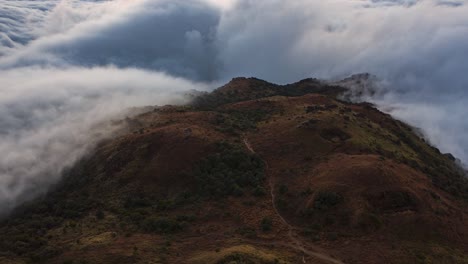 Motion-Timelapse-Of-Clouds-On-The-Mountain-Peak-In-Tai-Mo-Shan,-Hong-Kong-Blown-By-The-Wind---close-up