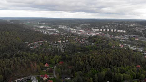 Aerial-Landscape-Shot-Of-Vast-Forest-And-Moody-Sky-Outside-Of-Gothenburg-In-Sweden