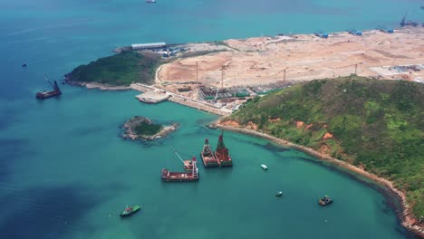 Top-view-flying-through-the-port-area-near-Clear-Water-Bay,-Hong-Kong