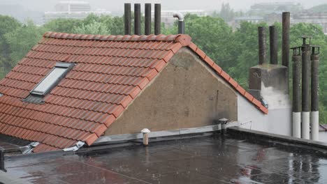 Heavy-Rain-Pouring-Down-On-Roofdeck-Of-A-House-With-Concrete-Tile-Roofing