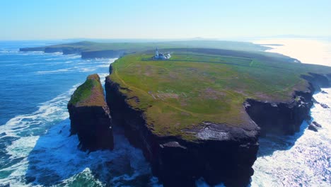 Aerial-view-of-a-lighthouse-while-flying-towards-it