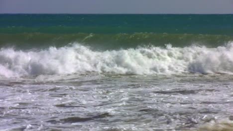 Surfer-jumps-off-board-in-El-saler-beach