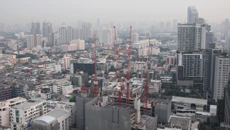 4K-Pollution-and-Construction-Site-Over-the-Metropolitan-City-of-Bangkok,-Thailand