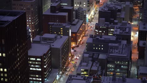 Close-up-shot-of-urban-city-with-snowed-in-roads-at-night