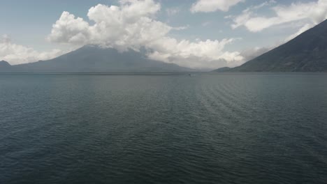 Drone-flying-over-waters-of-Atitlan-Lake-in-Guatemala
