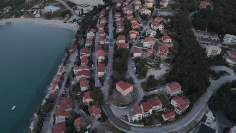 aerial-buildings-overlooking-Kvarner-Bay,-Rabac,-Istria,-Croatia