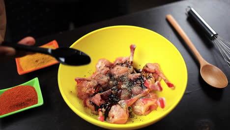 after-mixing-the-black-pepper-with-fresh-cutting-chicken-chef-add-black-soy-sauce-with-that-for-prepare-food