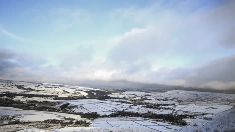 Time-lapse-of-snow-covered-hills-and-country-side