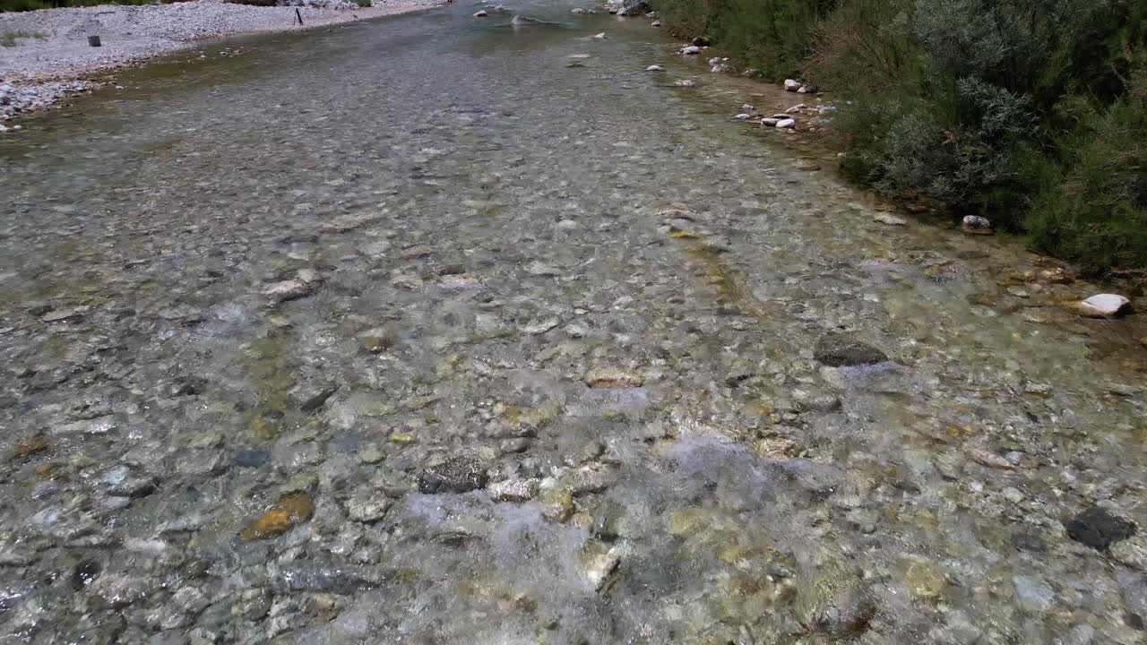 Premium stock video - Riverbed texture with clean transparent water of ...