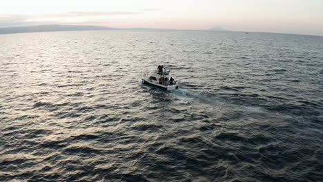 Fishermen-On-Motorboat-Sailing-Around-Adriatic-Sea-Fishing-For-Tuna-During-Early-Morning-In-Croatia