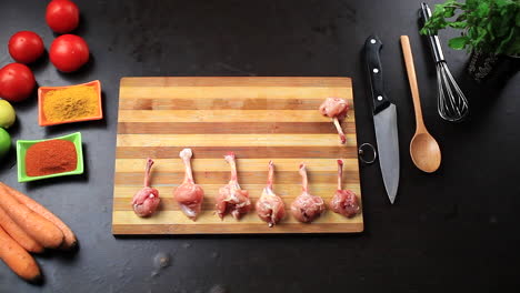 fresh-raw-chicken-wings-on-a-chopping-board-preparing-for-delicious-food-recipe
