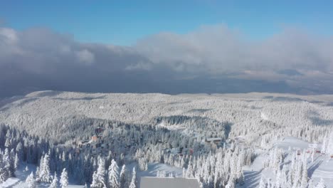 Village-Surrounded-By-Dense-Forest-Near-Jahorina-Mountain-During-Winter-Season-In-Bosnia-And-Herzegovina