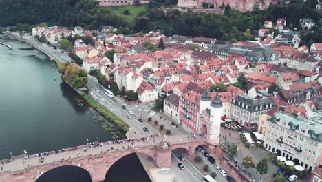 Aerial-drone-shot-of-the-cityscape-of-heidelberg,-the-heidelberg-castle-and-the-old-bridge-of-heidelberg