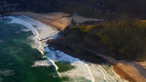 Turquoise-Water-And-Foamy-Waves-Washing-Shore-At-North-Era-Beach-In-Royal-National-Park,-New-South-Wales,-Australia---aerial-drone-shot