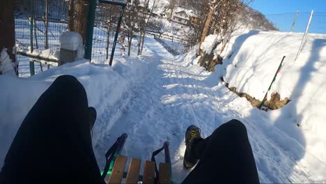 a-man-sledding-downhill