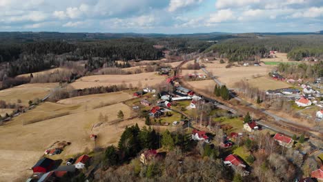 Aerial-panoramic-view-of-rural-houses-at-countryside-in-Rävlanda,-Sweden