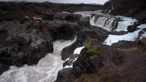 Zoom-Out-from-Scenic-Cascading-Barnafoss-Waterfall-in-Iceland