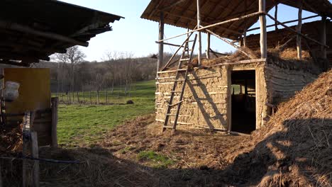 Old-Damaged-Stable-For-Animals-Made-From-Clay