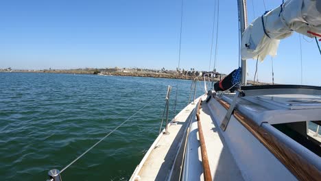 riding-in-a-sailboat-down-a-marina