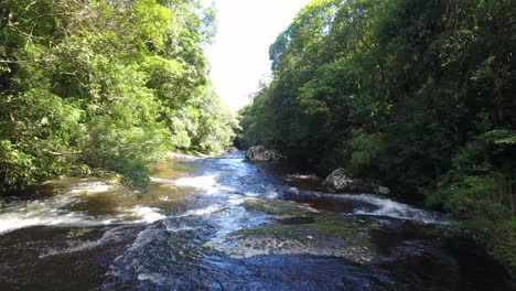 Pure-river-with-smalls-waterfalls-in-drone-scene