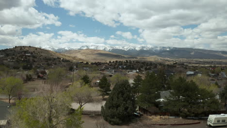 Reno-Nevada-Residential-Flyover-with-Beautiful-Snow-Covered-Mountains-and-Mt
