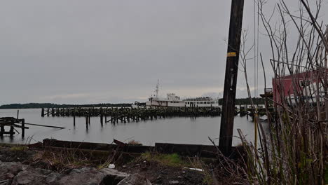 Old-Vessel-At-The-Empire-Dock-In-Coos-Bay,-Oregon-On-A-Moody-Weather