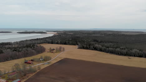 Wide-drone-view-of-rural-Swedish-landscape-in-early-spring
