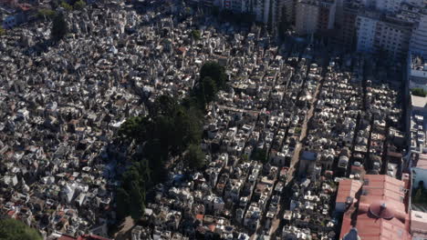 AERIAL---Recoleta-Cemetery,-Buenos-Aires,-Argentina,-wide-rising-circle-pan