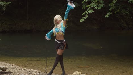 Anime-cosplayer-using-her-whip-in-nature-at-an-amazing-clear-water-stream