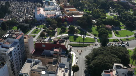 AERIAL---Recoleta-and-Cemetery,-Buenos-Aires,-Argentina,-wide-forward-pan-left