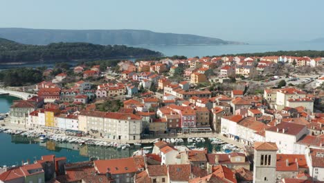 Beautiful-fishing-town-on-island-of-Cres-Croatia,-4K-aerial-view
