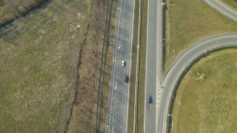 Cars-moving-on-speed-road-S7-Cdry-Poland-Aerial-view-from-top-to-bottom